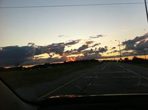 One day on the way home, you look up past the road and see a gorgeous sunset.  You are not on some distant mountaintop in an exotic land, just on your way home.  This is not the first beautiful sunset, but it may be the first one you've noticed in a long time. Open your life to enjoy the beauty that surrounds you every day.